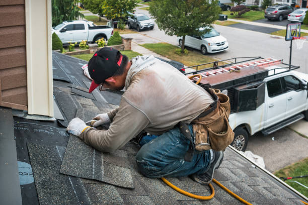 Professional Roofing technician working in Amherst, NH